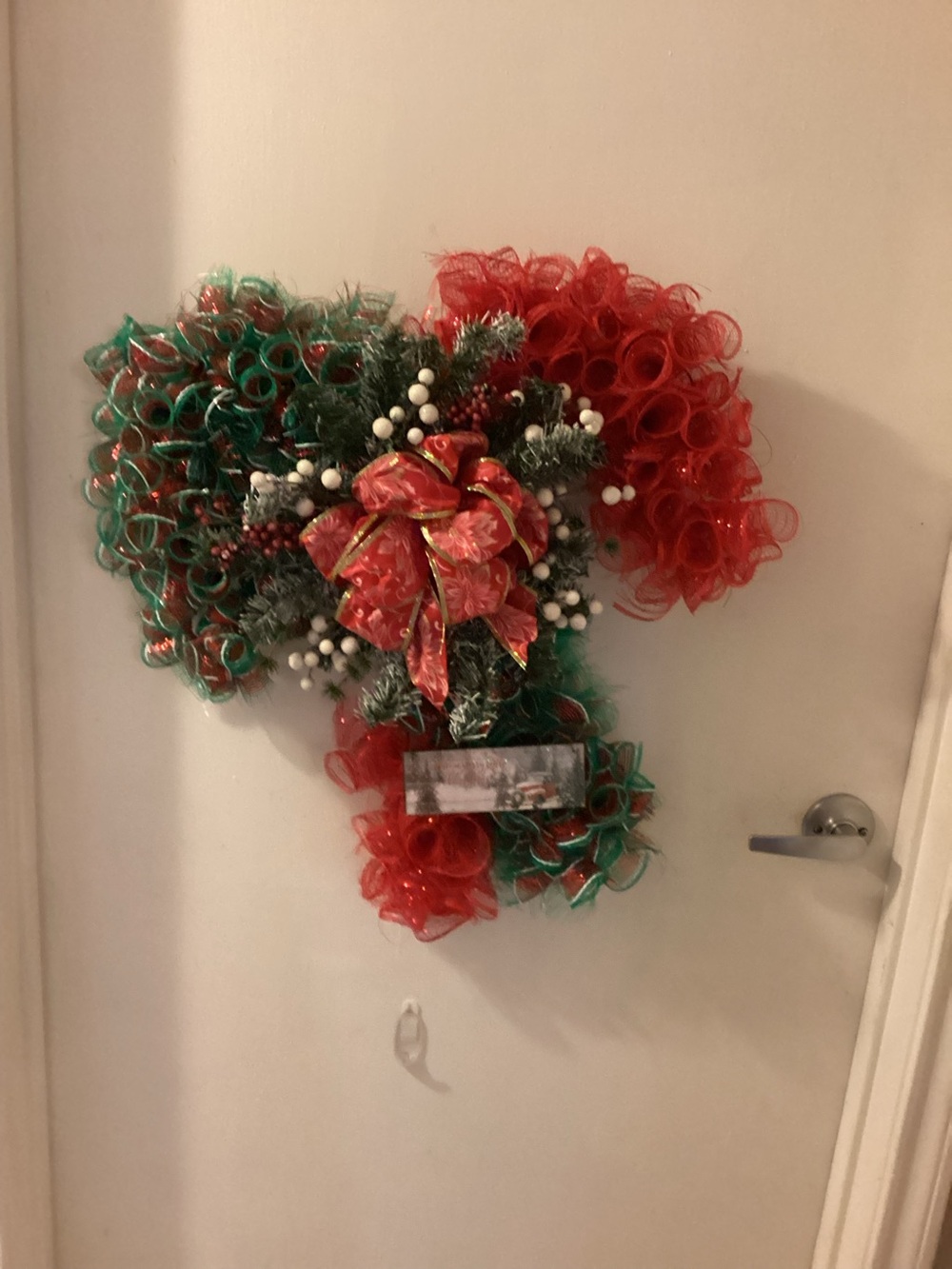 Candy cane Christmas wreath with red bow